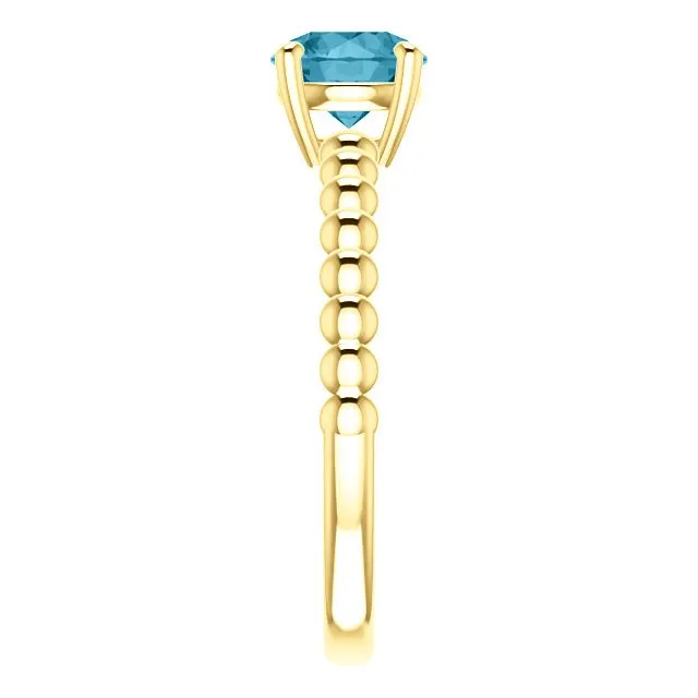 14KT GOLD 1.05 CT LONDON BLUE TOPAZ BEADED SOLITAIRE RING