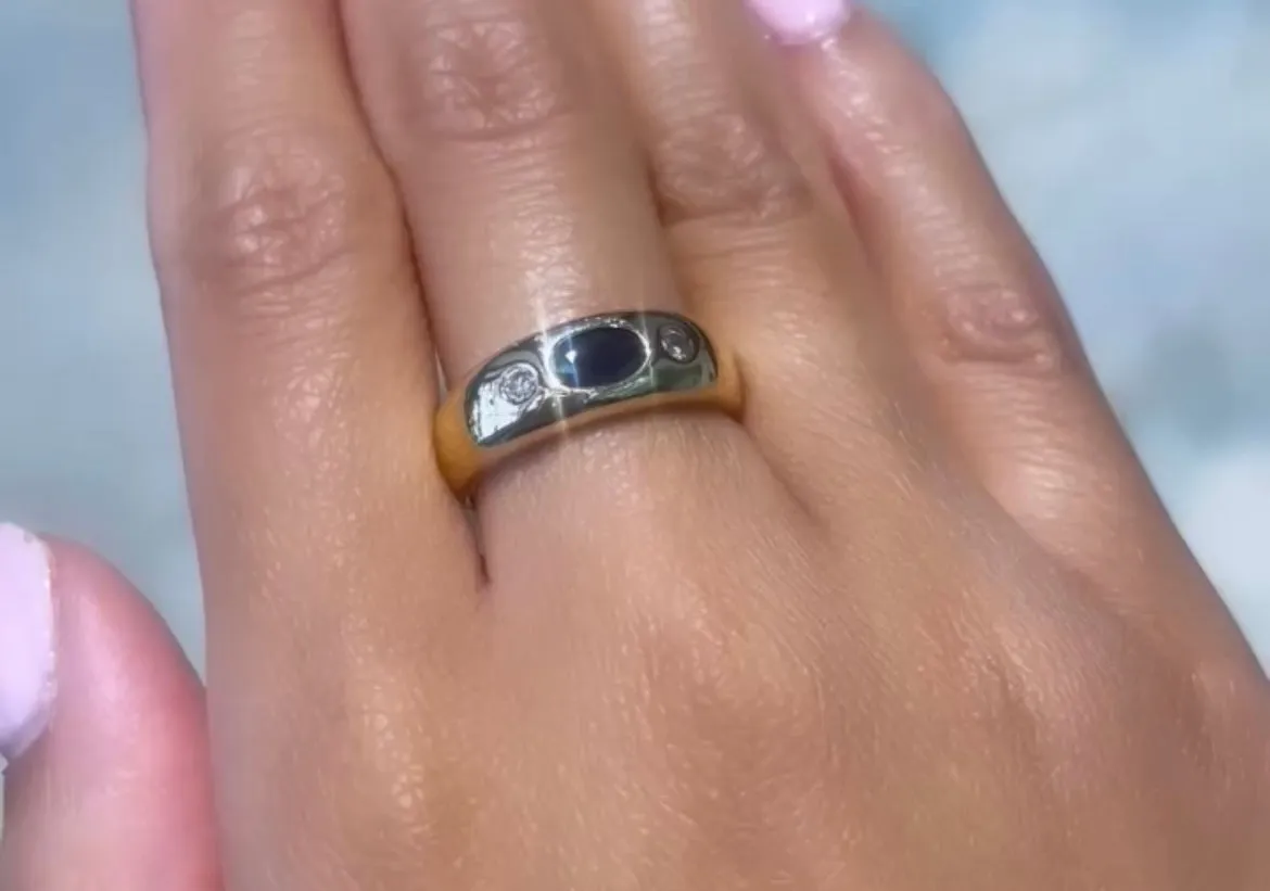 Sapphire and diamond trilogy ring in 18 carat gold.