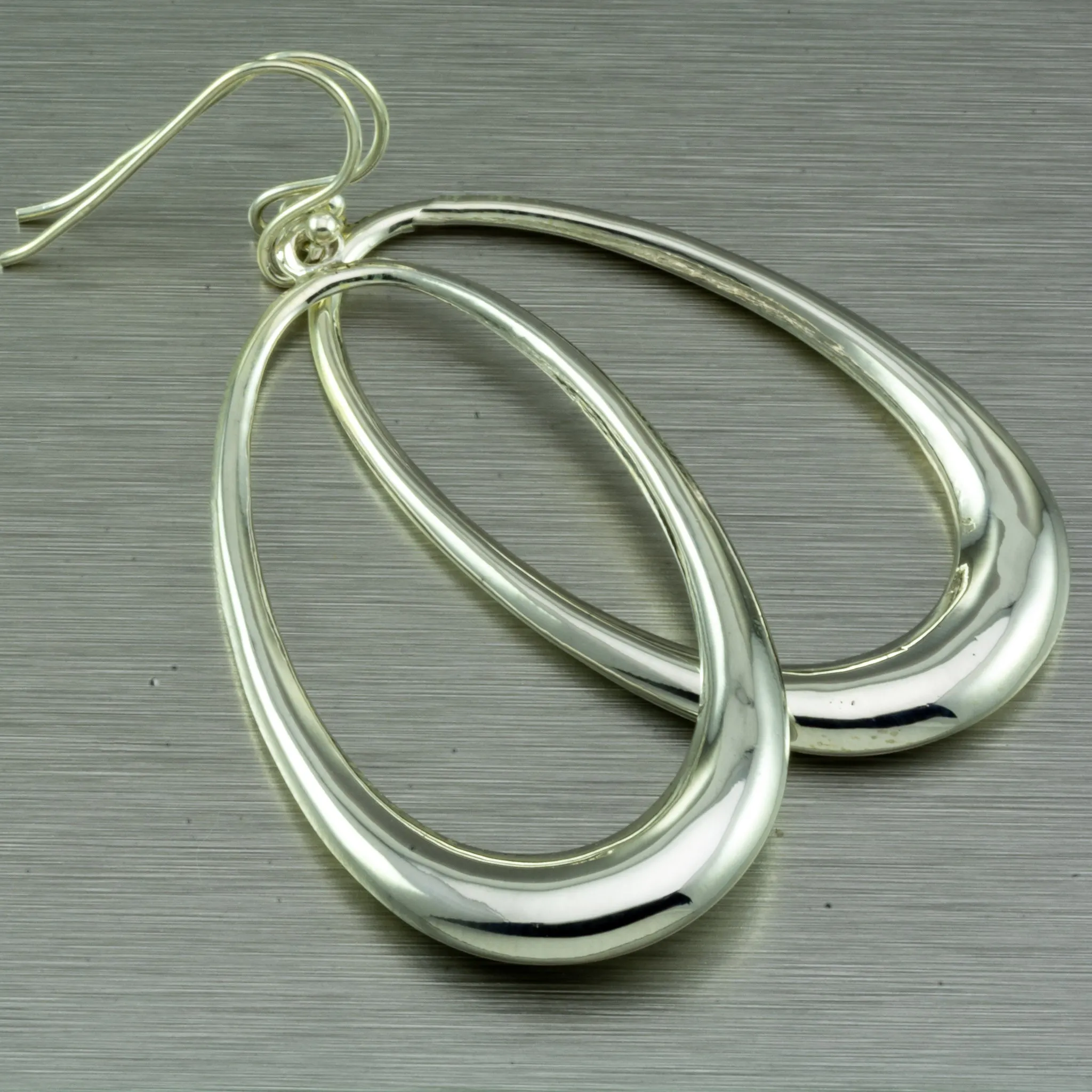 Sterling Silver Loopy Hoop Earrings.